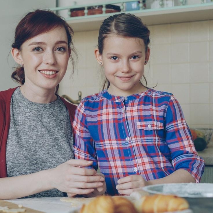 Alex Chen, Lead Design Curator at SpringCanvasOpal, reviewing corporate floral arrangements